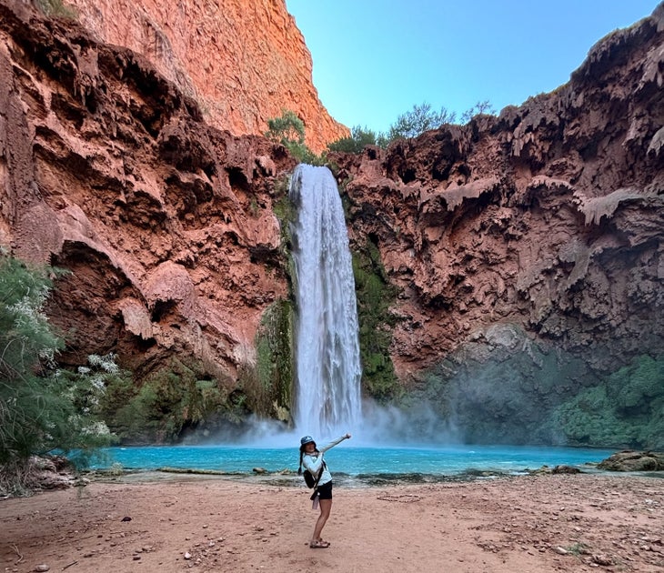 Author Madison Dapcevich stands in front of Mooney Falls 