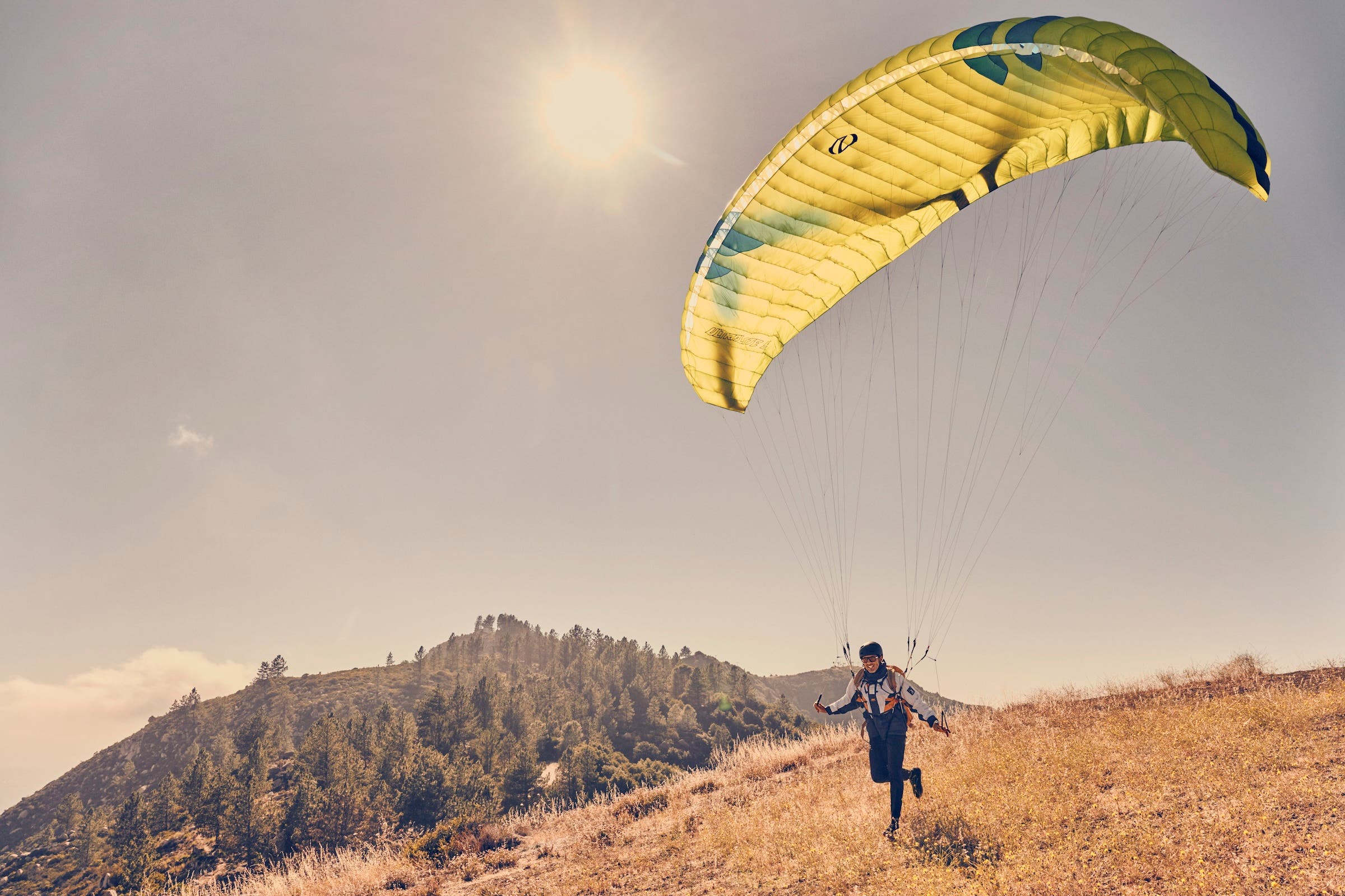 marshall miller, human flight pro, about to take off while paragliding