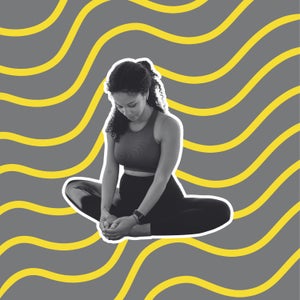 woman doing a hip stretch on a way background