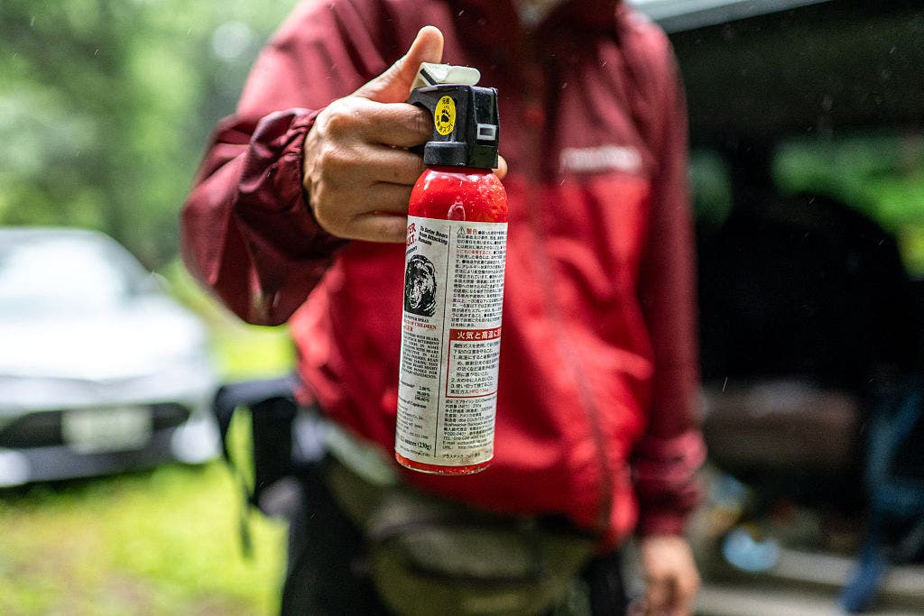 Wild bear expert Akiko Takii shows a can of bear spray that she carries for safety while entering forests in Ina, Nagano Prefecture on July 6, 2026