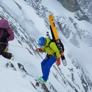 Top right: Erin Smart lowering a client into the La Voûte couloir in La Grave.