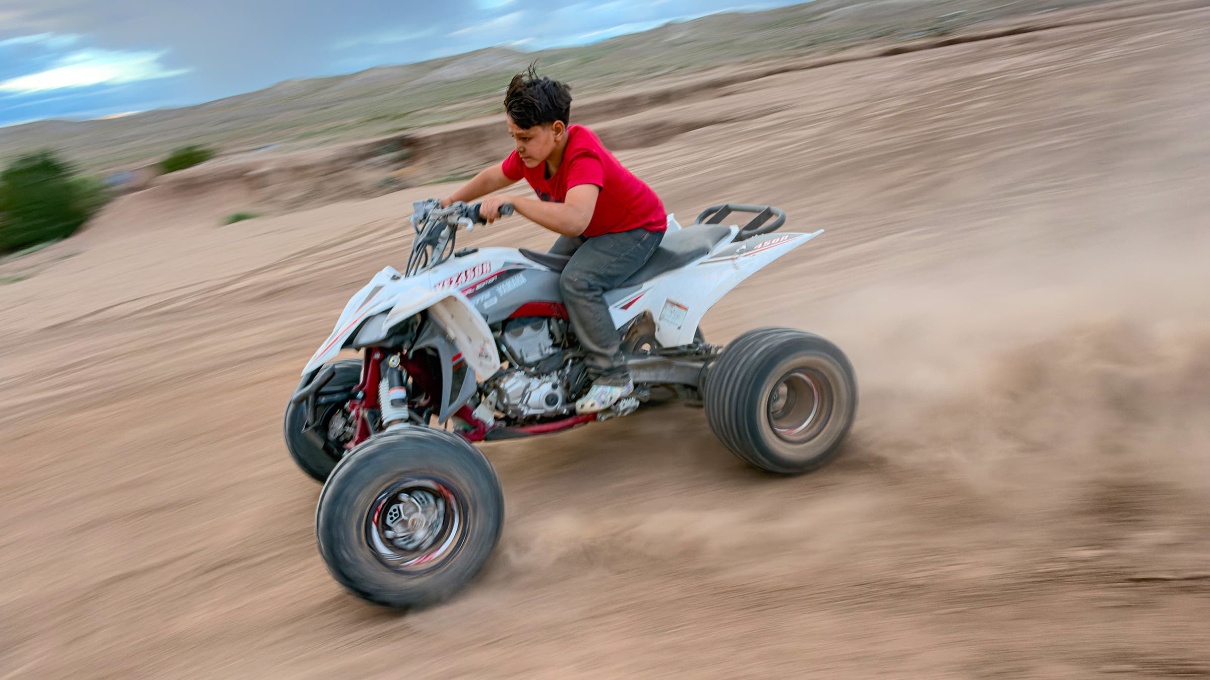 4-wheeler moving fast with blurred background shot with iPhone 18 PR