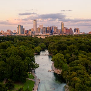 Austin skyline with Barton Creek in the foreground.