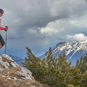 woman hiking downhill