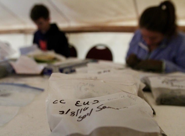 Archaeologists catalog soil samples collected from the Crescent Creek Campground