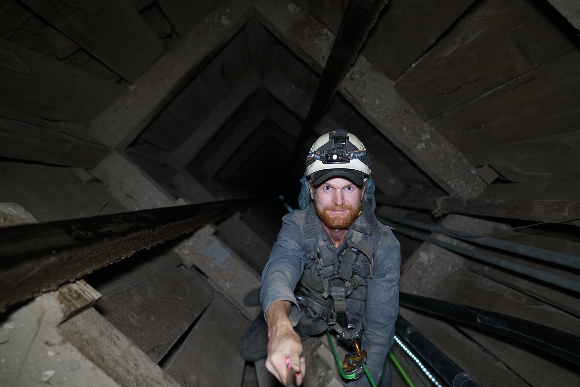 The author descending down a mining shaft