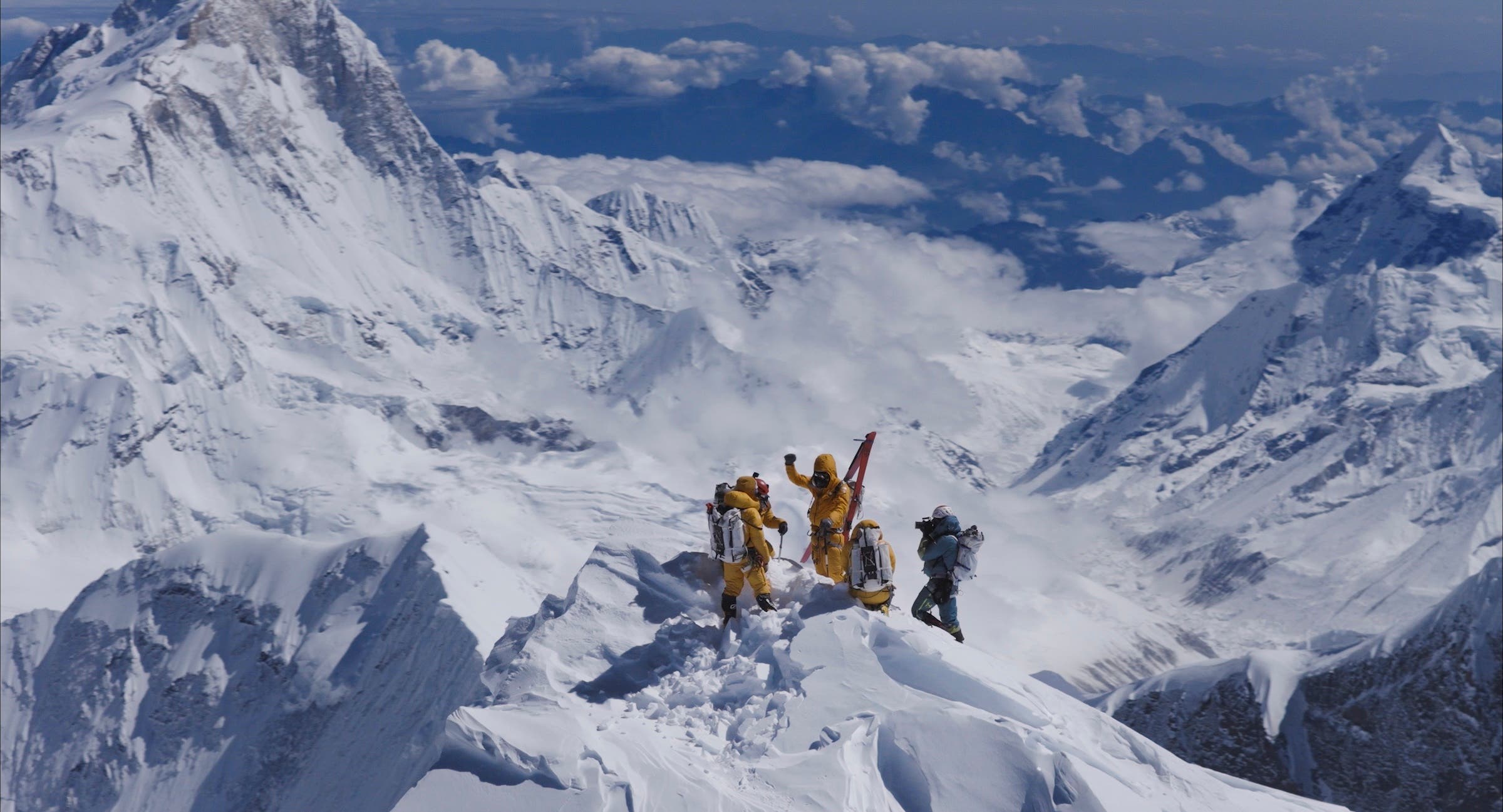 (L to R) Pur Bahadur "Yukta" Gurung, Jimmy Chin, Jim Morrison, Erich Roepke, and Pemba Sherpa (Sharwa) on the summit of Mount Everest.