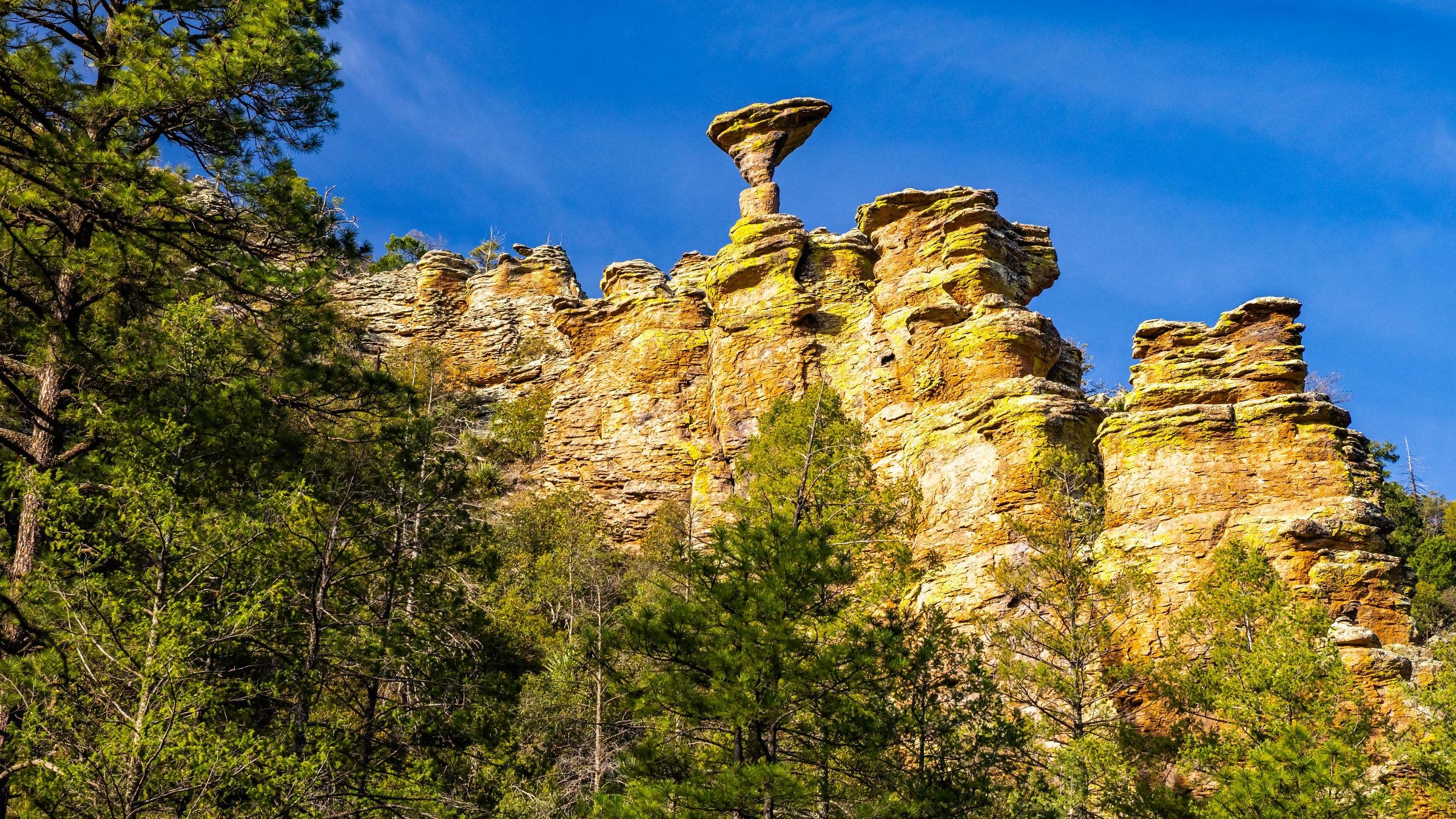 Mushroom Rock Balanced Formation in Chiricahua National Monument Arizona - stock photo Distinctive mushroom shaped balanced rock formation rising from rugged landscape in Chiricahua National Monument
