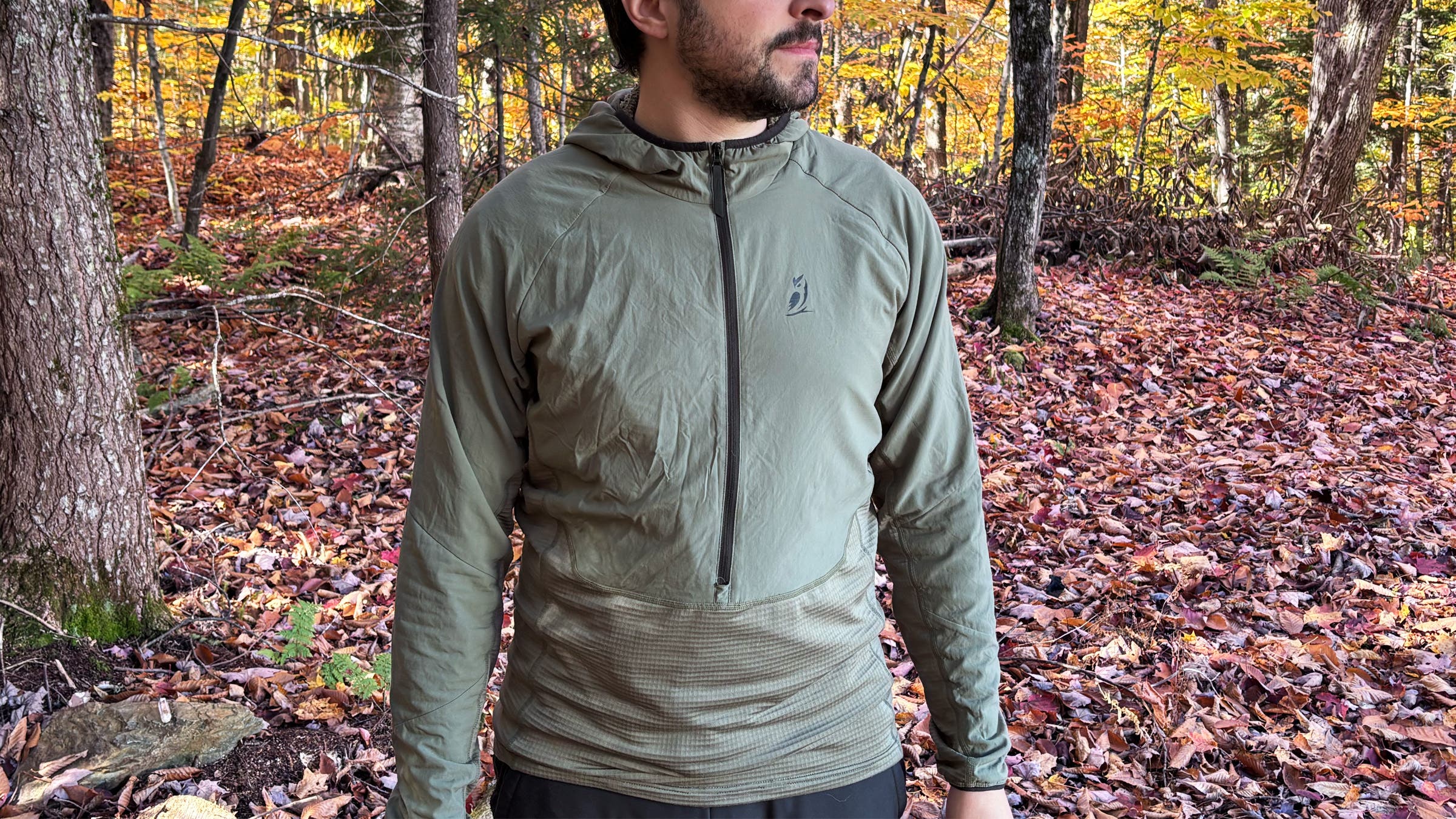 Hiker wearing green Outdoor Vitals Pursuit Hybrid Fleece
