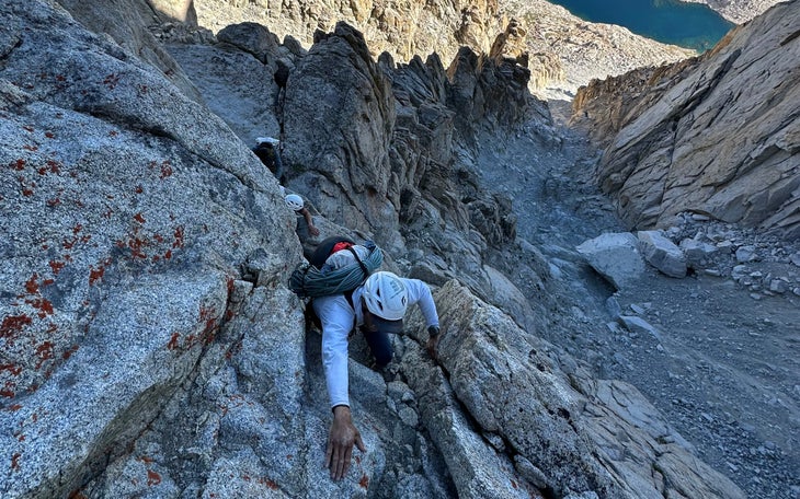 Two climbers ascend rocks in the Sierra Nevada