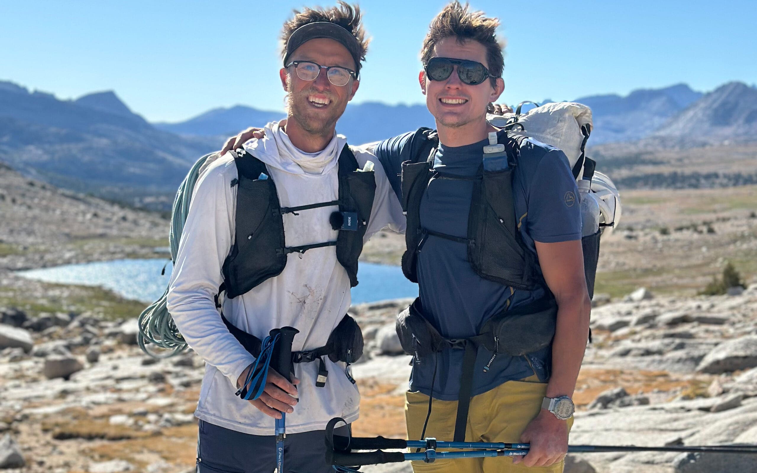 Two climbers with hiking poles