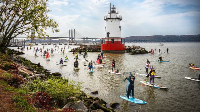 Witches Are Taking Over America's Waterways on Paddleboards. Here's Where to See Them.