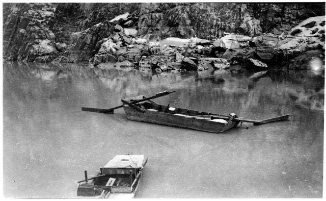 Glen and Bessie Hyde's sweep boat in the Colorado River of the Grand Canyon, 1928