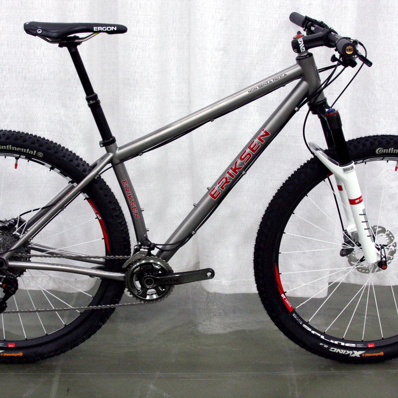 At less than 22 pounds, Kent Eriksen Cycles' 29er titanium hardtail is built for speed. Welder and elite racer Brad Bingham was touring Italy with a friend in 2009, they discovered a crumbling 1,200 year old school with 鈥渘on senza fatica鈥 chiseled into the stone. Translation: "Nothing without effort," a fitting motto for Bingham, who etched it onto the top tube.
