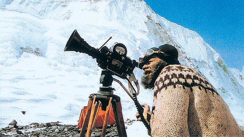 Kurt Diemberger filming in camp.