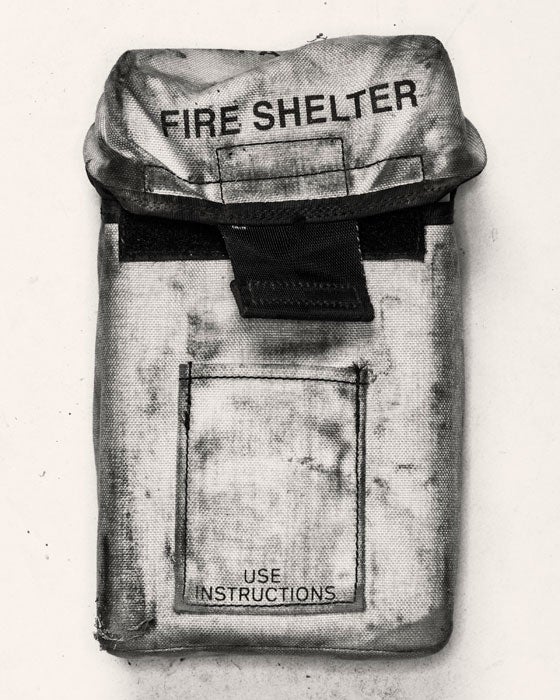 An intact emergency fire shelter