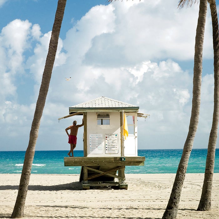 Atlantic Copy space Florida Miami beach color image lifeguard ocean on duty safety sand shore south beach tourism travel vacation vertical water lifeguard job