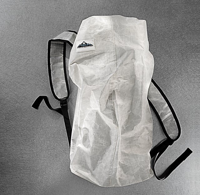 A waterproof pack that weighs no more than a garbage bag and can fit in your back pocket.