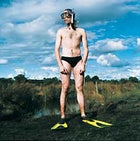 Bog love god: English snorkeler Martin Fisher, 25, stands rall after finishing third in the trench