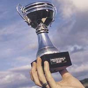 Big win, li'l trophy: For world-record holder John Cantillion, it's the thought that counts