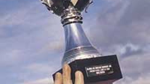 Big win, li'l trophy: For world-record holder John Cantillion, it's the thought that counts