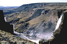 Summer thaw: melting ice carves a canyon in Iceland