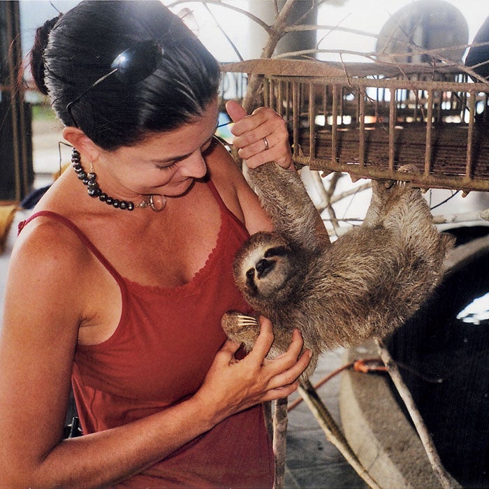 Ann with a three-toed sloth in 2006. Boracayan's first and foremost purpose was to serve as a large-scale private haven for endangered, abandoned, or injured animals.