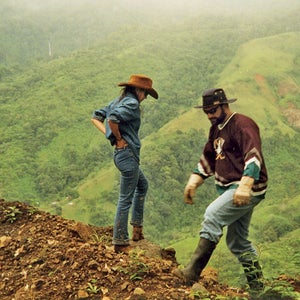 A brilliant American financier and his exotic wife build a lavish mansion in the jungles of Costa Rica, set up a wildlife preserve, and appear to slowly, steadily lose their minds. A spiral of handguns, angry locals, armed guards, uncut diamonds, abduction plots, and a bedroom blazing with 550 Tiffany lamps ends with a body and a compelling mystery: Did John Felix Bender die by his own hand? Or did Ann Bender kill him to escape their crumbling dream?
John and Ann inspecting road damage after a landslide. The couple weren't alone on Boracayan; they also hired teams of armed rangers, full-time animal caretakers, researchers and security guards.
 
Read the full story: Love and Madness In the Jungle