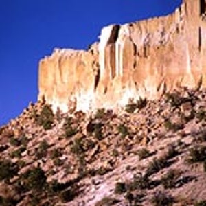 Rock-ride recipe: sun bathed cliffs and scrub at New Mexico's Pajarito Plato