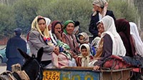 Uighur people in the ancient market town of Kashgar, China