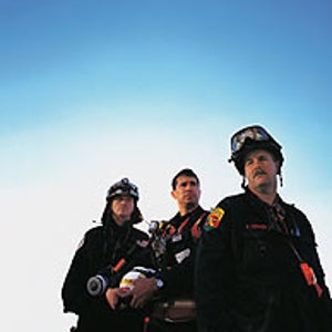 Left to right: physican Bill Trolan, caver Carl Levon Kustin, and wildland firefighter Bob Tooker after an exhausting shift