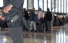 Boarding pass: armed security at Boston's Logan International Airport