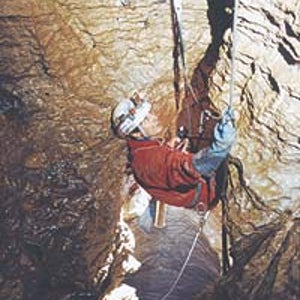 Going down: a Cavex explorer descends a new pitch in Krubera Cave en route to the 1,710-meter depth record