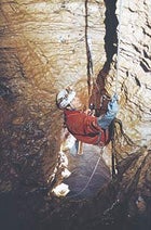 Going down: a Cavex explorer descends a new pitch in Krubera Cave en route to the 1,710-meter depth record