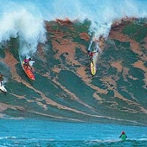 Art Brewer (The Surfer's Journal, $65), The second volume in the Masters of Surf Photography series, collects more than 30 years of this camera Kahuna's Ultrasoulful Workfrom action shots like this one of Dennis Pang, Marvin Foster, and the late Mar