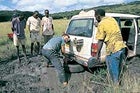 The author jacks up the bogged Pajero