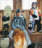 Jake Burton, son Timmy, and Ruby the retriever at home in Stowe, Vermont