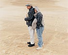 Grover Taylor (holding model) and Rick Young at the outer banks, North Carolina, March 2002