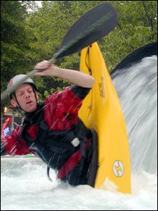 World-renowned kayaker Jimmy Blakeney shows off in the Confluence kayak pool.