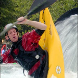 World-renowned kayaker Jimmy Blakeney shows off in the Confluence kayak pool.