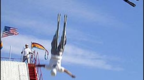 We don't need no stinkin' snow: Tommy DeAngelo and Lance Rouleau fly skyward after making jumps only seconds apart.