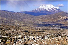 The 21,200-foot Illimani Volcano standing tall above La Paz, Bolivia.