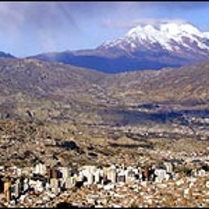 The 21,200-foot Illimani Volcano standing tall above La Paz, Bolivia.
