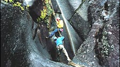 Look out below: a Canadian team attempts Low's Gully, March 2002.