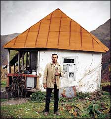 Guide Gela Khutsishvili, outside a forester's cabin at 6,400 feet.