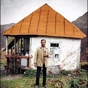 Guide Gela Khutsishvili, outside a forester's cabin at 6,400 feet.