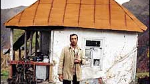 Guide Gela Khutsishvili, outside a forester's cabin at 6,400 feet.