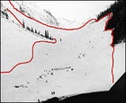 Two hours after the February 1 avalanche (red outline), a probe line of rescuers (center) looks for survivors