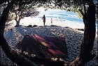 Parents holding vigil while the kids hit the surf on Mahai'ulu beach