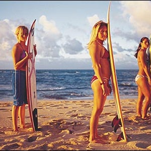 Gimme a break: from left, Keala Kennelly, Rochelle Ballard, and Megan Abubo at Sunset Beach, Oahu, October 24, 2002.